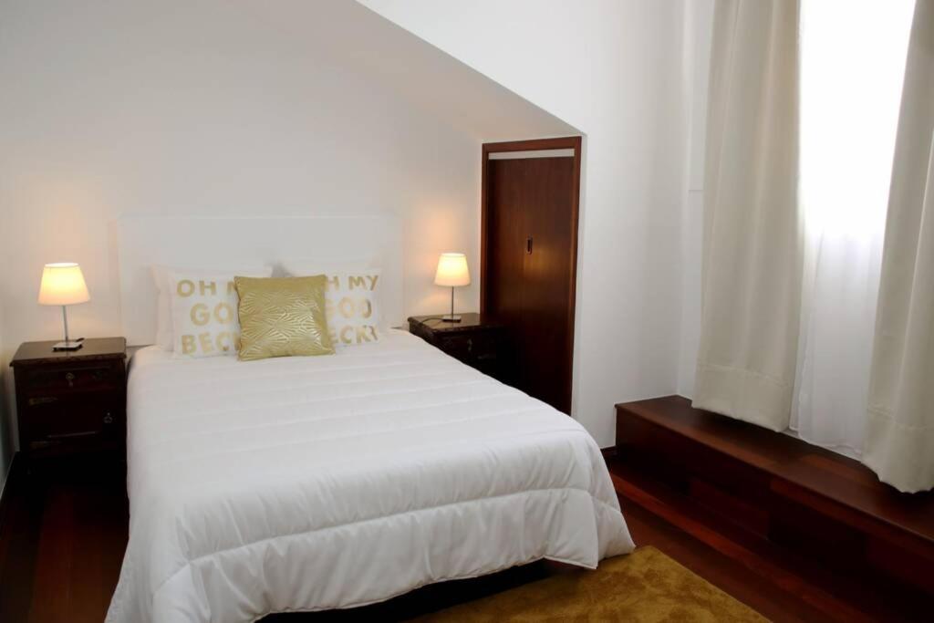 Postel nebo postele na pokoji v ubytování Alegria House