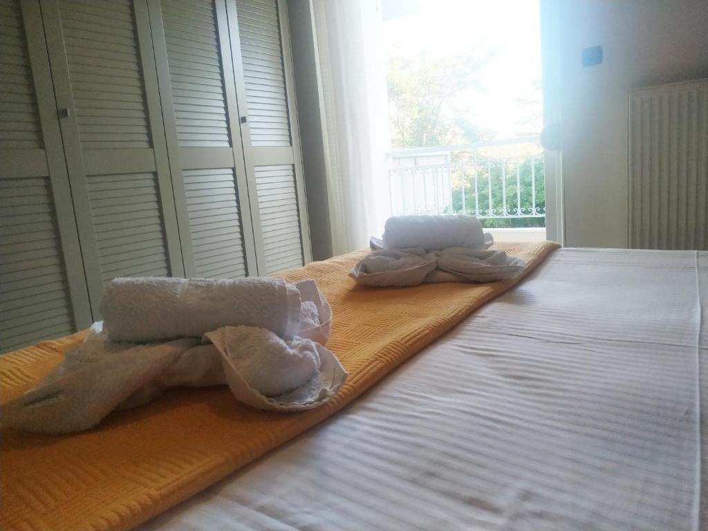Postel nebo postele na pokoji v ubytování Holiday Nest & parking