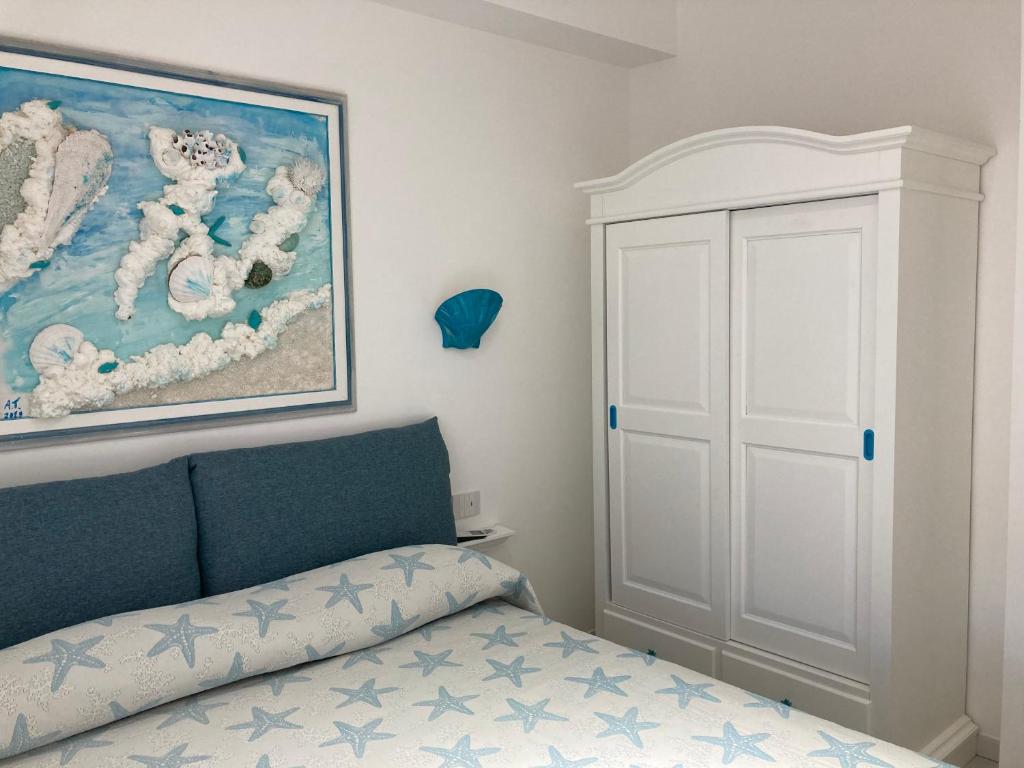 Postel nebo postele na pokoji v ubytování Appartamento Centro del Porto