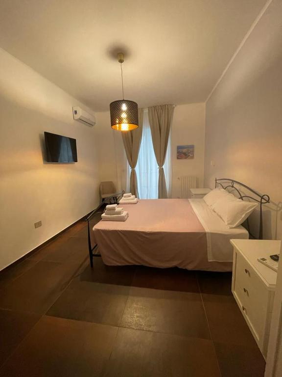 Posteľ alebo postele v izbe v ubytovaní Relais Petruzzelli