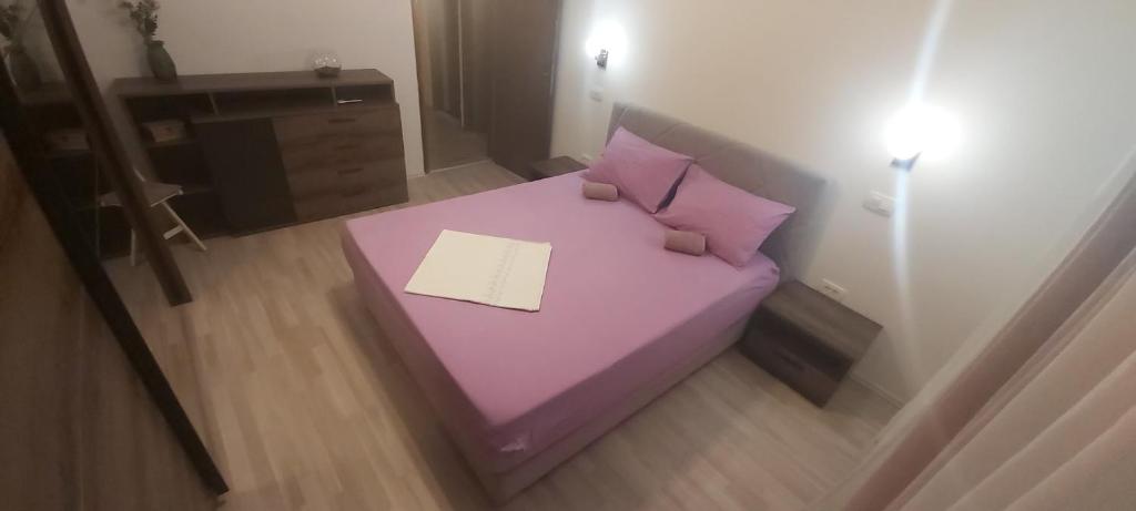 Posteľ alebo postele v izbe v ubytovaní Sunshine Apartment