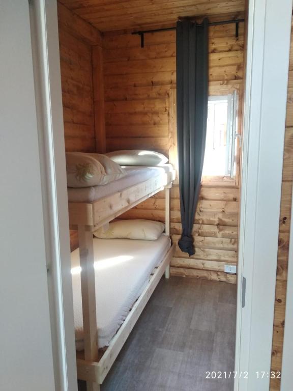Postel nebo postele na pokoji v ubytování Camping Borghetti