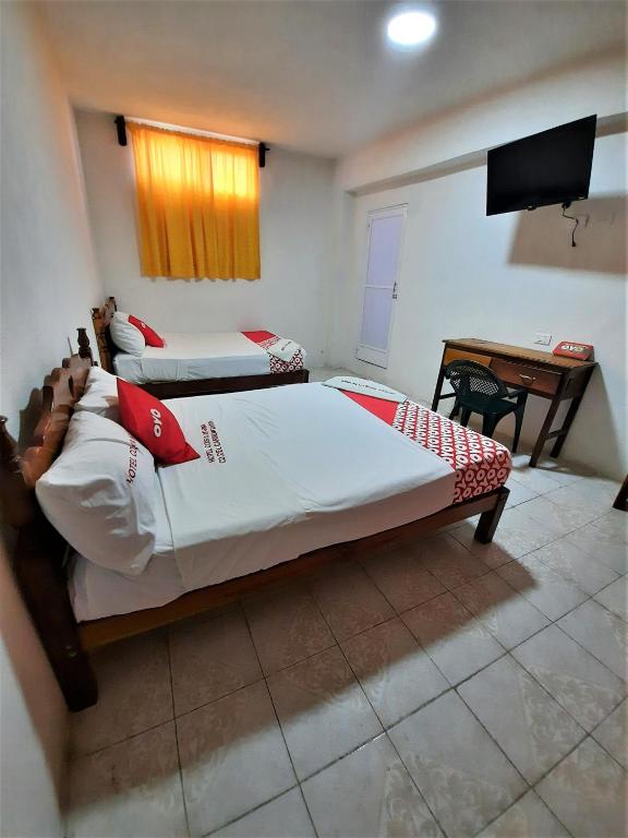 Postel nebo postele na pokoji v ubytování Hotel Costa Maria