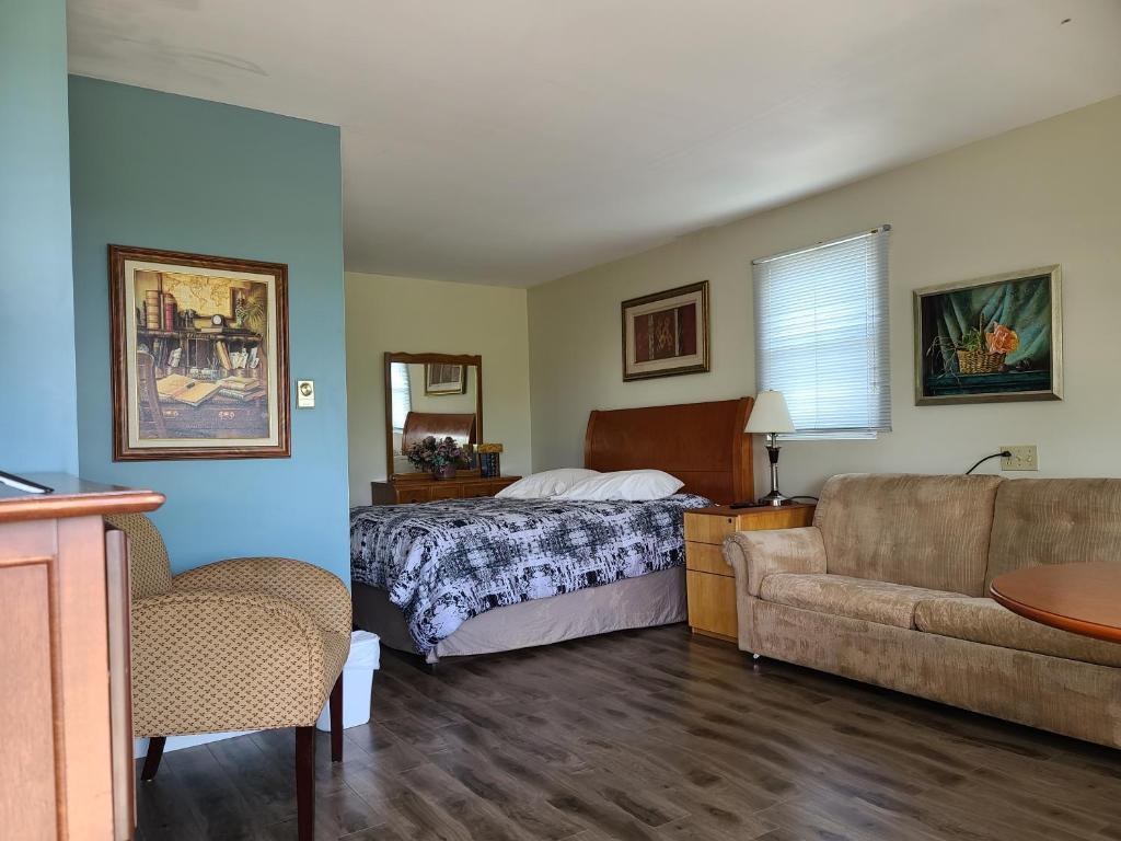 Postel nebo postele na pokoji v ubytování Bouctouche Bay Inn