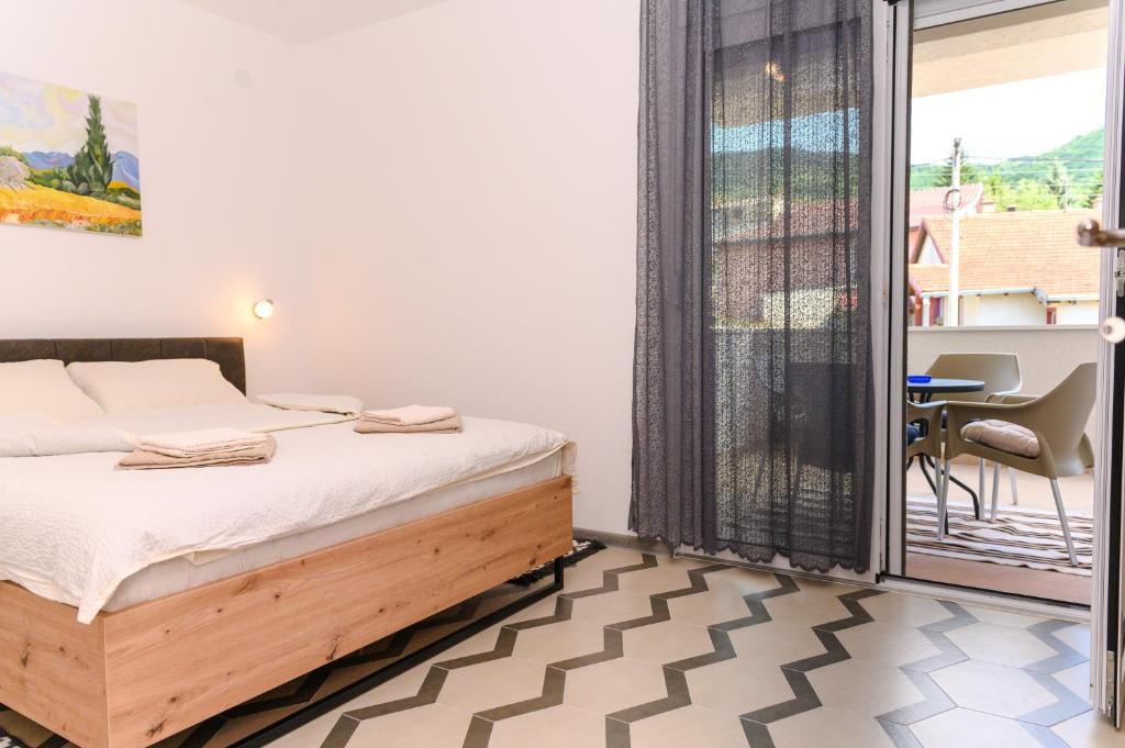 Krevet ili kreveti u jedinici u objektu Apartman N&P
