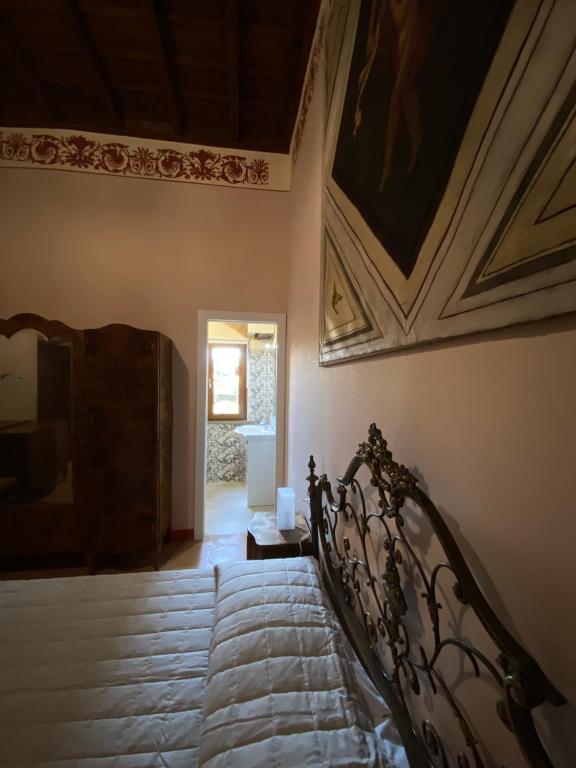 Posteľ alebo postele v izbe v ubytovaní Palazzo Forlani