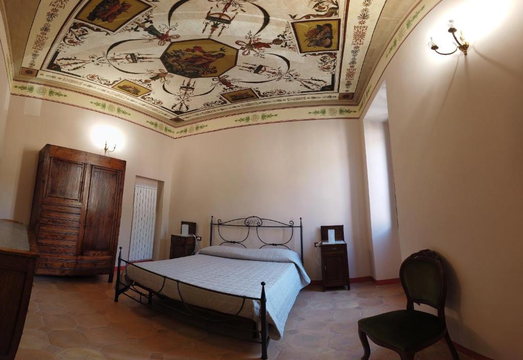 Posteľ alebo postele v izbe v ubytovaní Palazzo Forlani