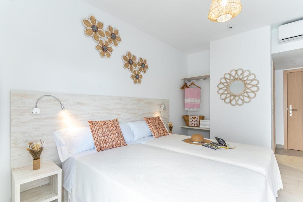 Cama o camas de una habitación en Hostal Rosell Boutique