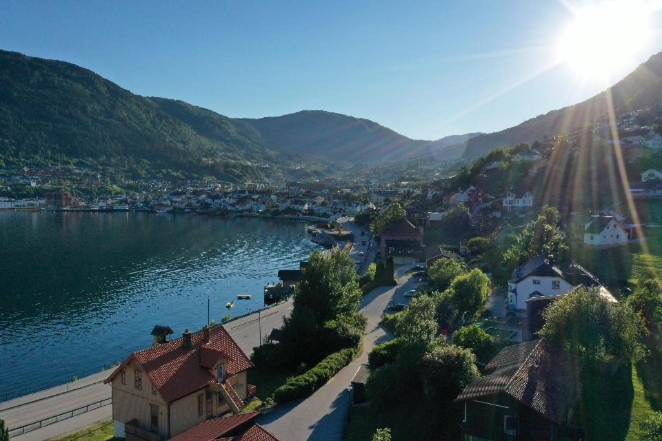 a view of a town next to a body of water at Sogndal Bed & Breakfast in Sogndal