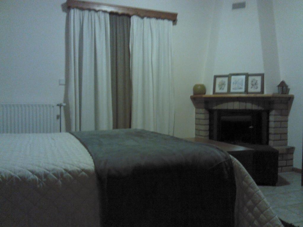 Posteľ alebo postele v izbe v ubytovaní Menta( Archontiko Machalioti )