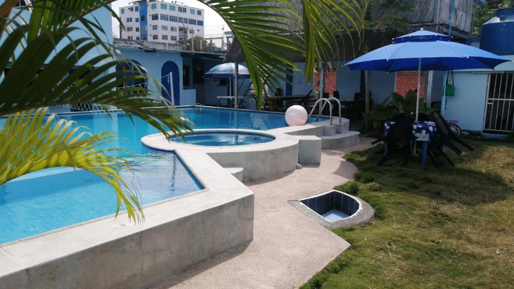 Bazén v ubytování Hostal Aruba nebo v jeho okolí