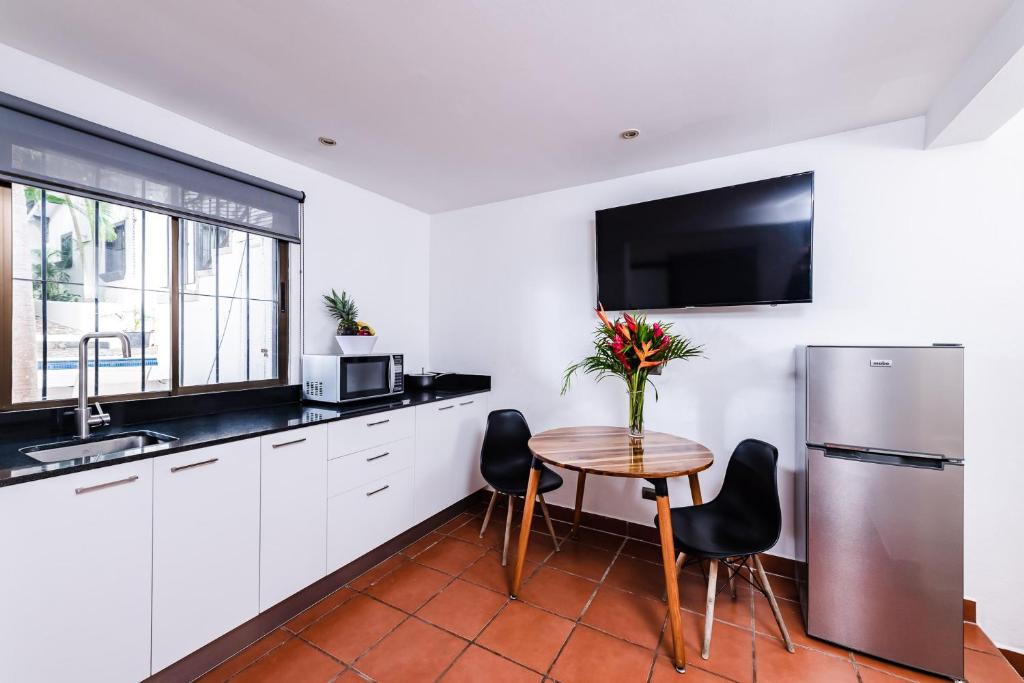 Kuchyň nebo kuchyňský kout v ubytování Hotel Gardenia Tamarindo