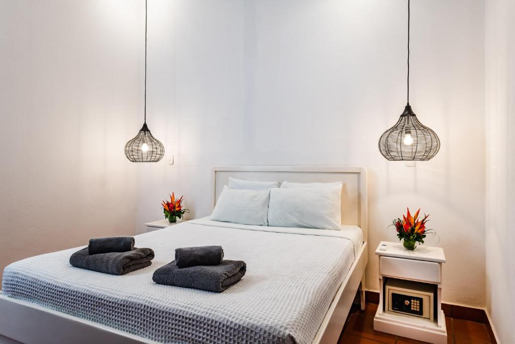 Postel nebo postele na pokoji v ubytování Hotel Gardenia Tamarindo