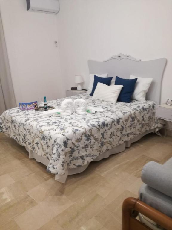 Postel nebo postele na pokoji v ubytování Cappuccini Green Relax