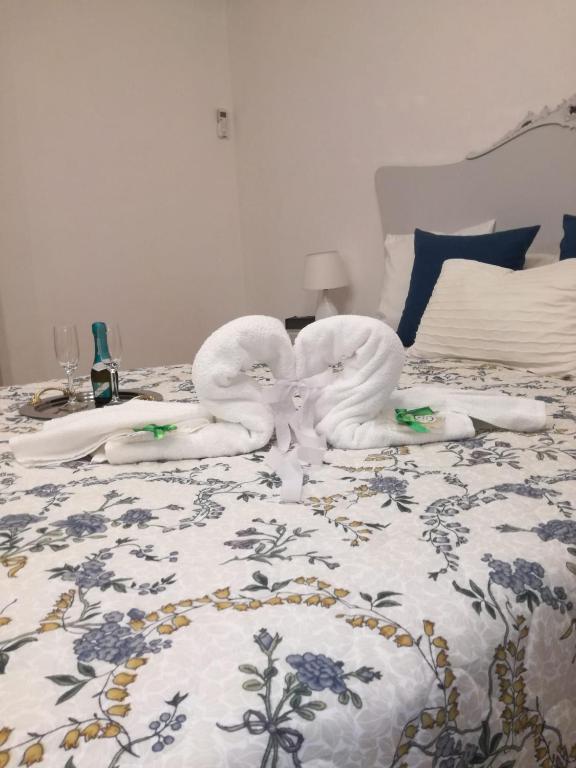 Postel nebo postele na pokoji v ubytování Cappuccini Green Relax