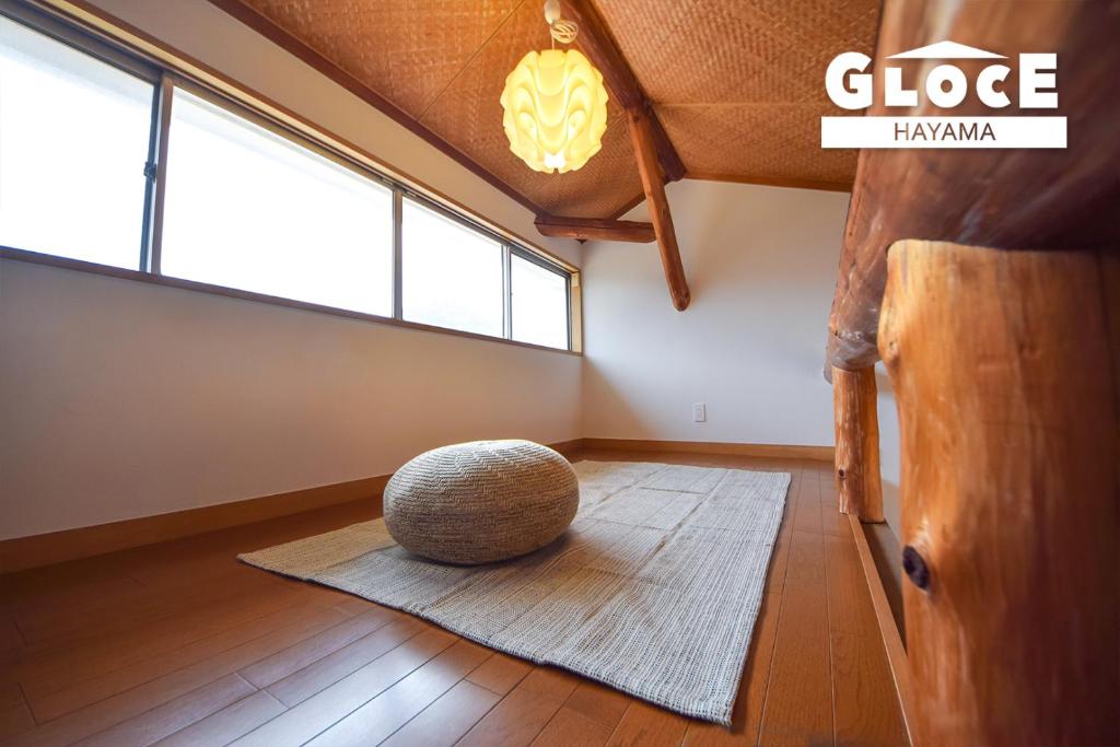 Postel nebo postele na pokoji v ubytování GLOCE 葉山 Ocean View House 都心から1時間 湘南の絶景を独り占めペットok 出張BBQ有り