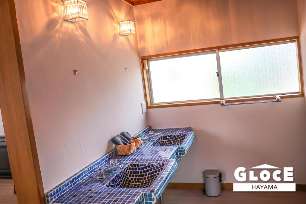 Fotografie z fotogalerie ubytování GLOCE 葉山 Ocean View House 都心から1時間 湘南の絶景を独り占めペットok 出張BBQ有り v destinaci Jokosuka