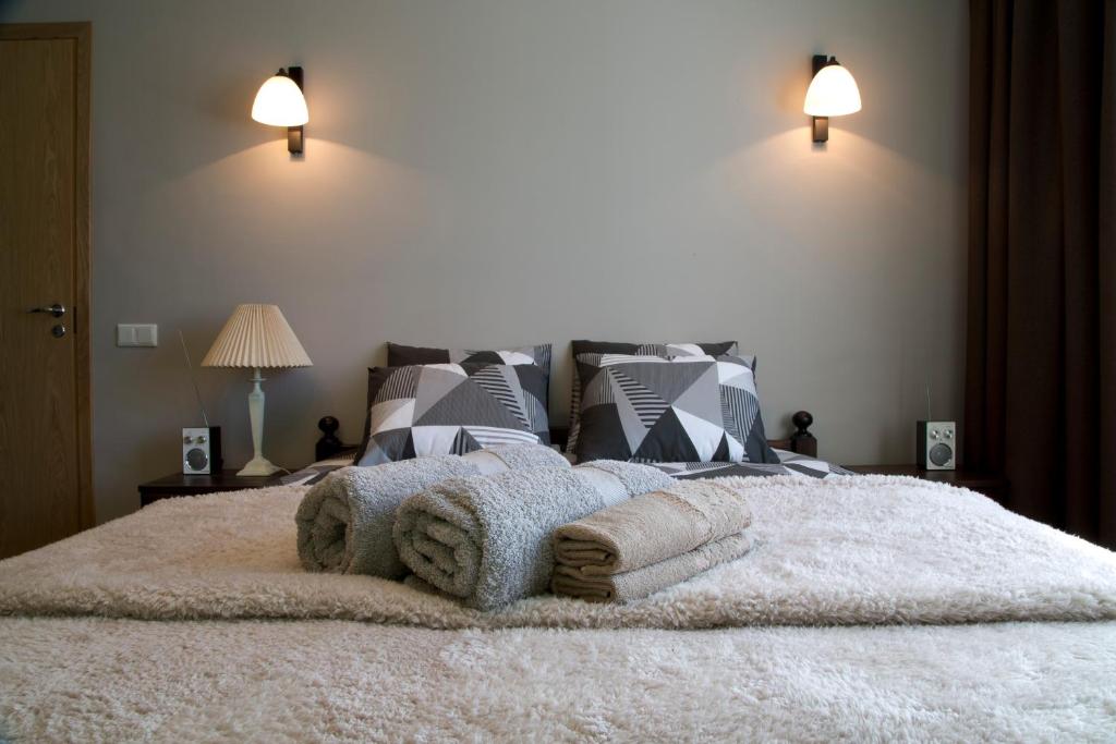 Cama o camas de una habitación en Prenzel Apartments - City