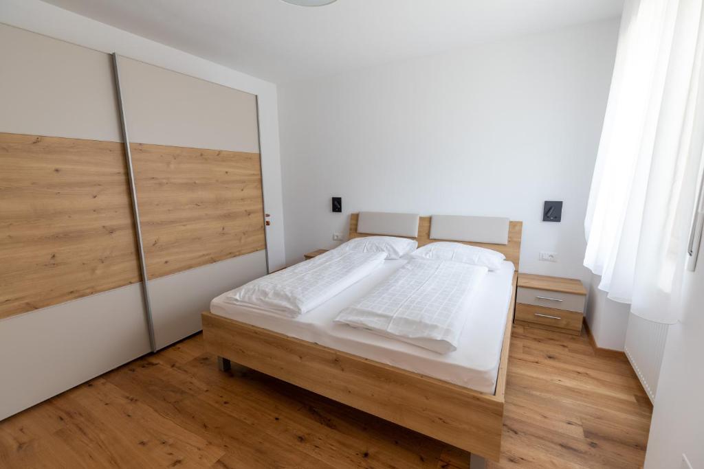 Postel nebo postele na pokoji v ubytování Innermoarhof