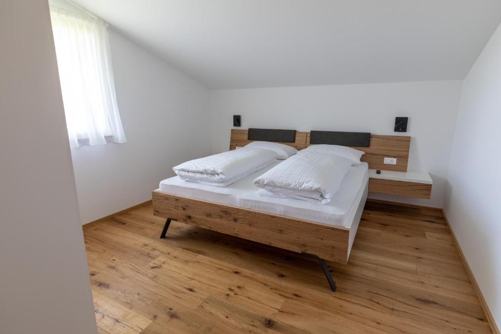 Postel nebo postele na pokoji v ubytování Innermoarhof