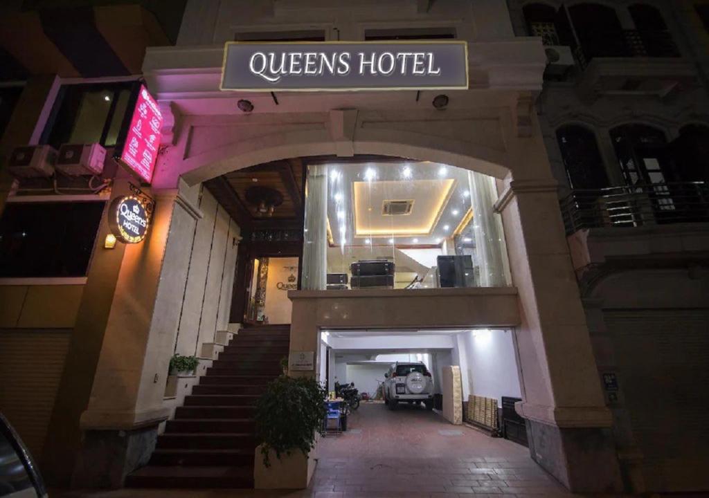 a building with a sign that reads queens hotel at QUEEN'S Hotel in Hanoi