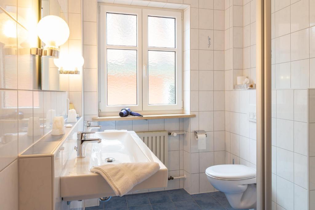 Koupelna v ubytování Goldener Schwan Hotel Garni