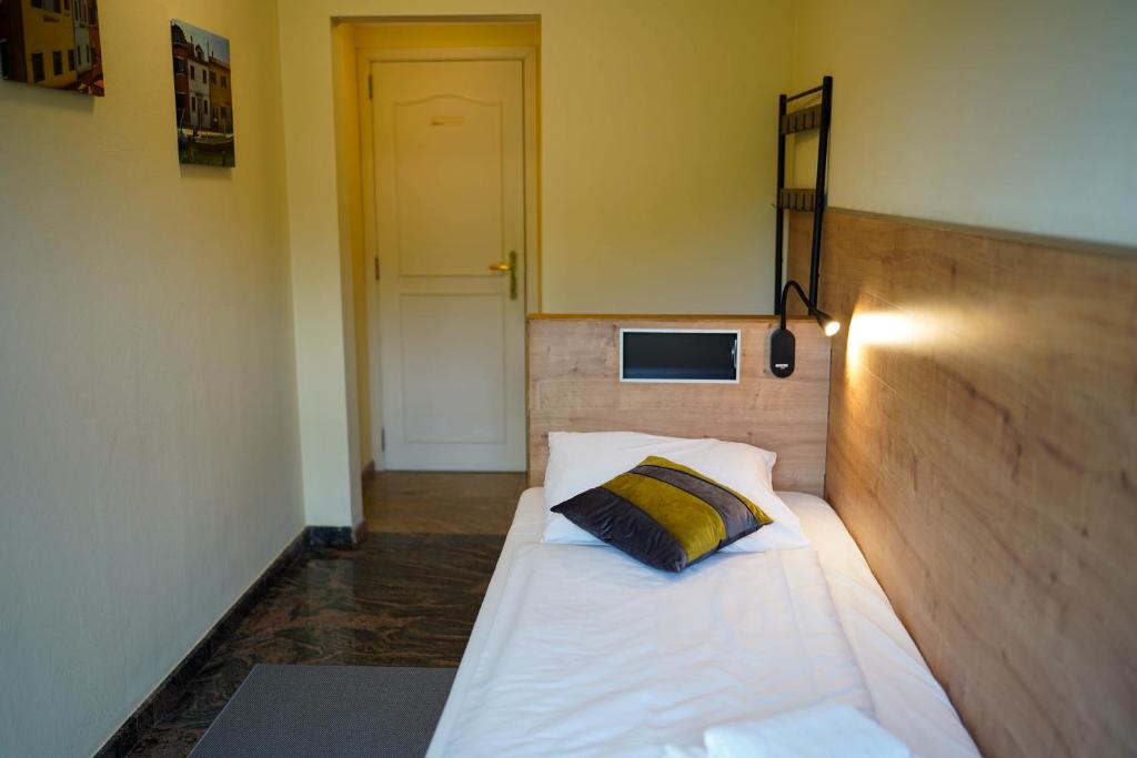 Postel nebo postele na pokoji v ubytování Hotel Prins van Oranje