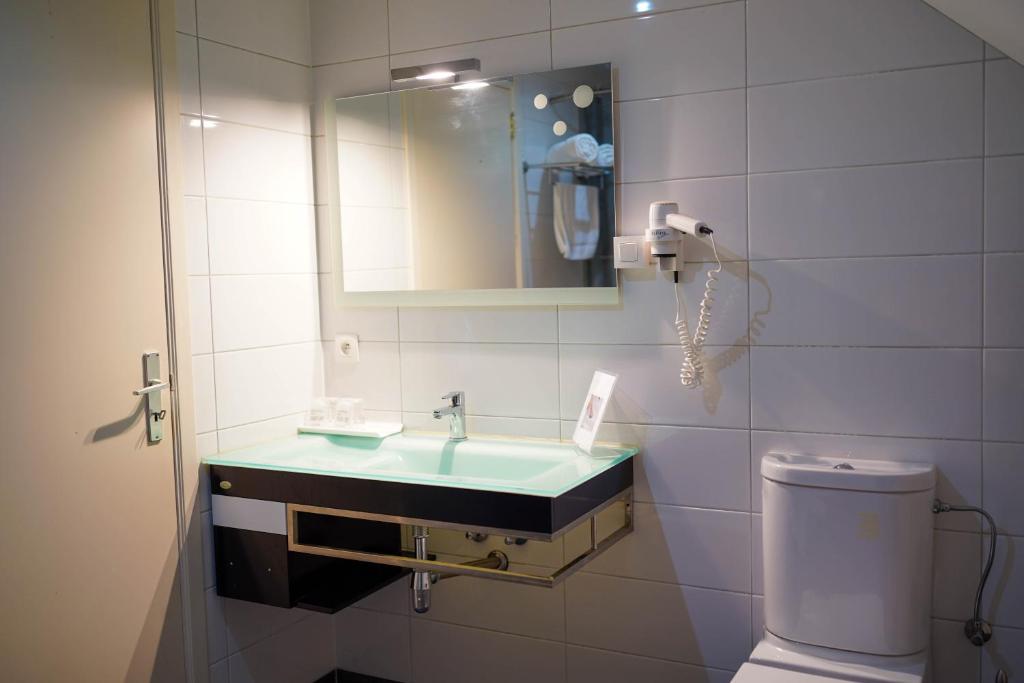 Koupelna v ubytování Hotel Prins van Oranje