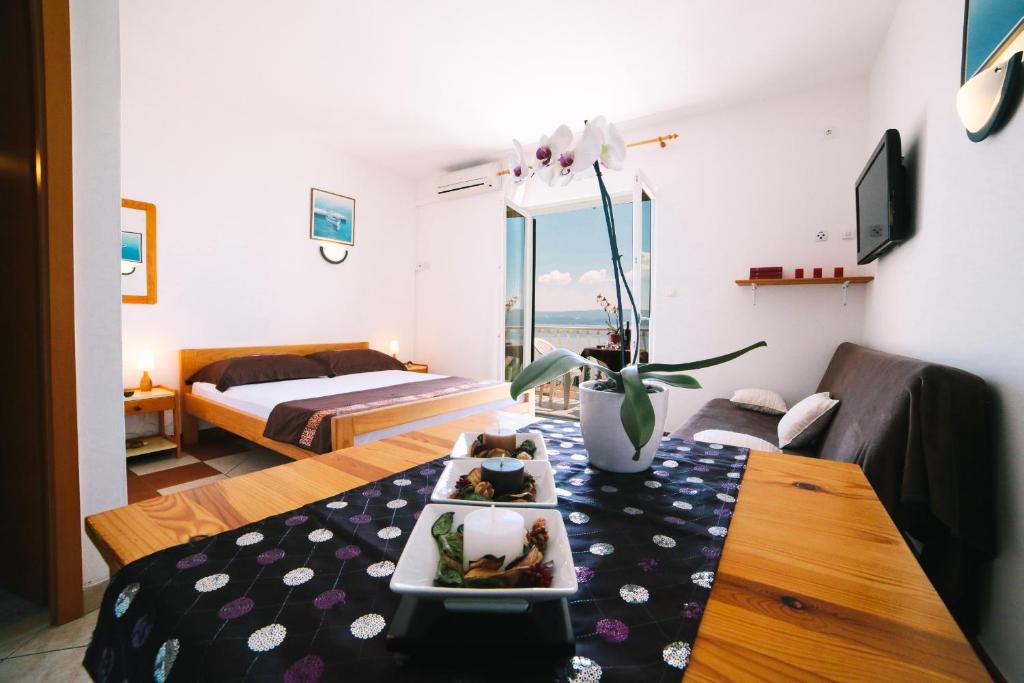 Postel nebo postele na pokoji v ubytování Villa Brigita
