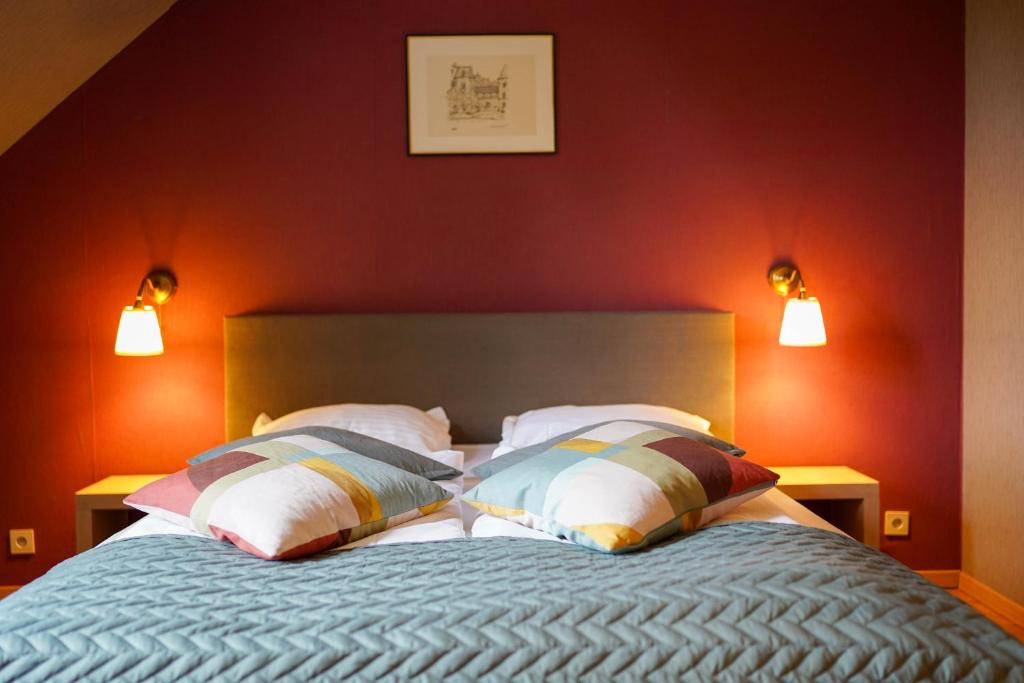 Postel nebo postele na pokoji v ubytování Hotel Prins van Oranje