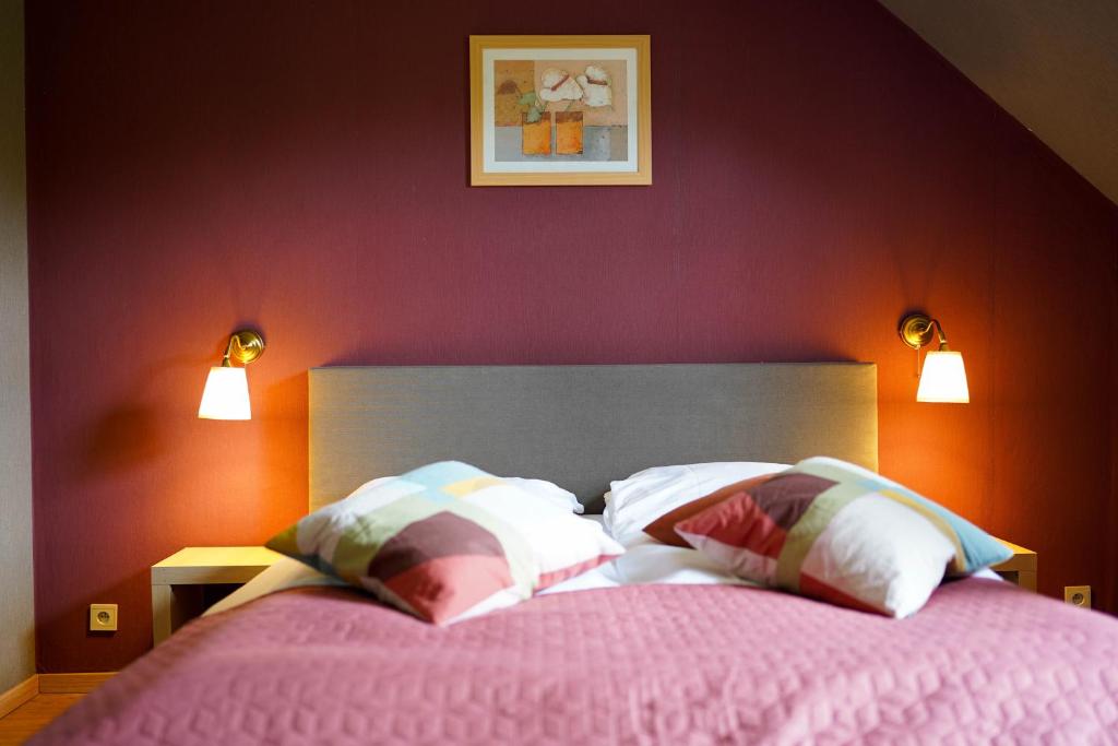 Postel nebo postele na pokoji v ubytování Hotel Prins van Oranje
