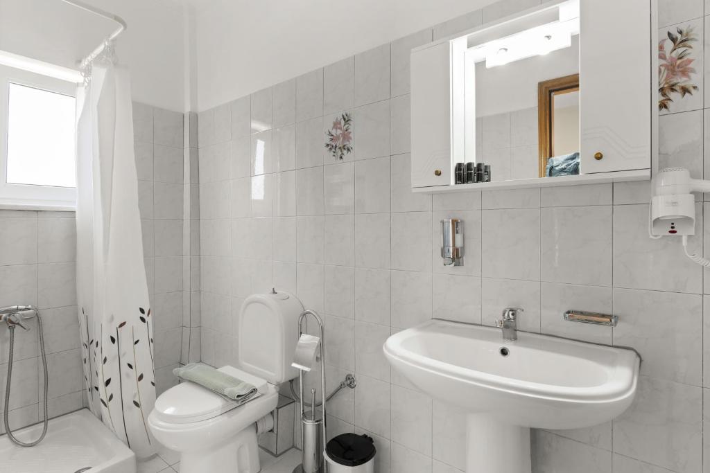 Kúpeľňa v ubytovaní Delphin Rooms Sivota