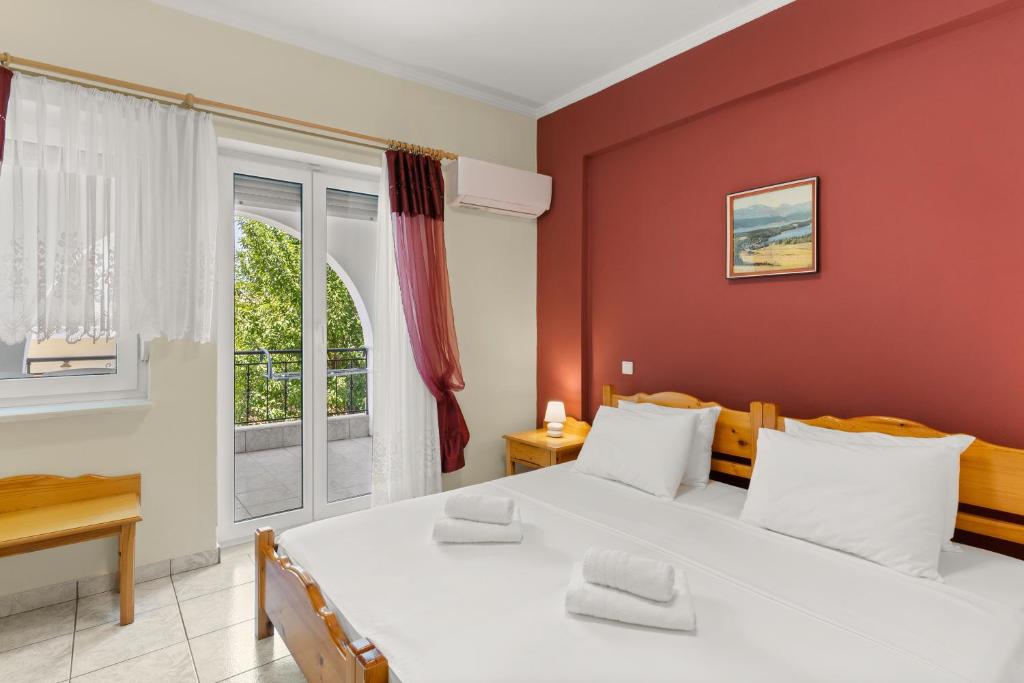 Posteľ alebo postele v izbe v ubytovaní Delphin Rooms Sivota