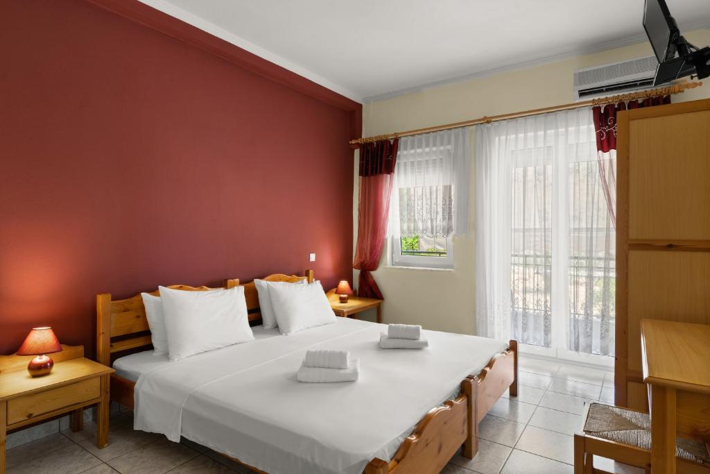 Posteľ alebo postele v izbe v ubytovaní Delphin Rooms Sivota