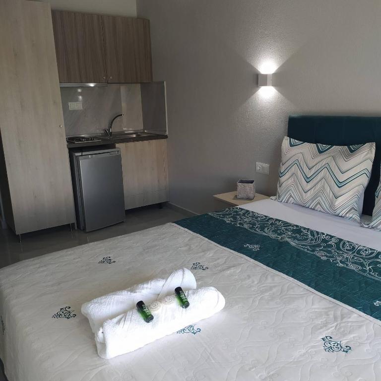Łóżko lub łóżka w pokoju w obiekcie Mei's luxury apartments