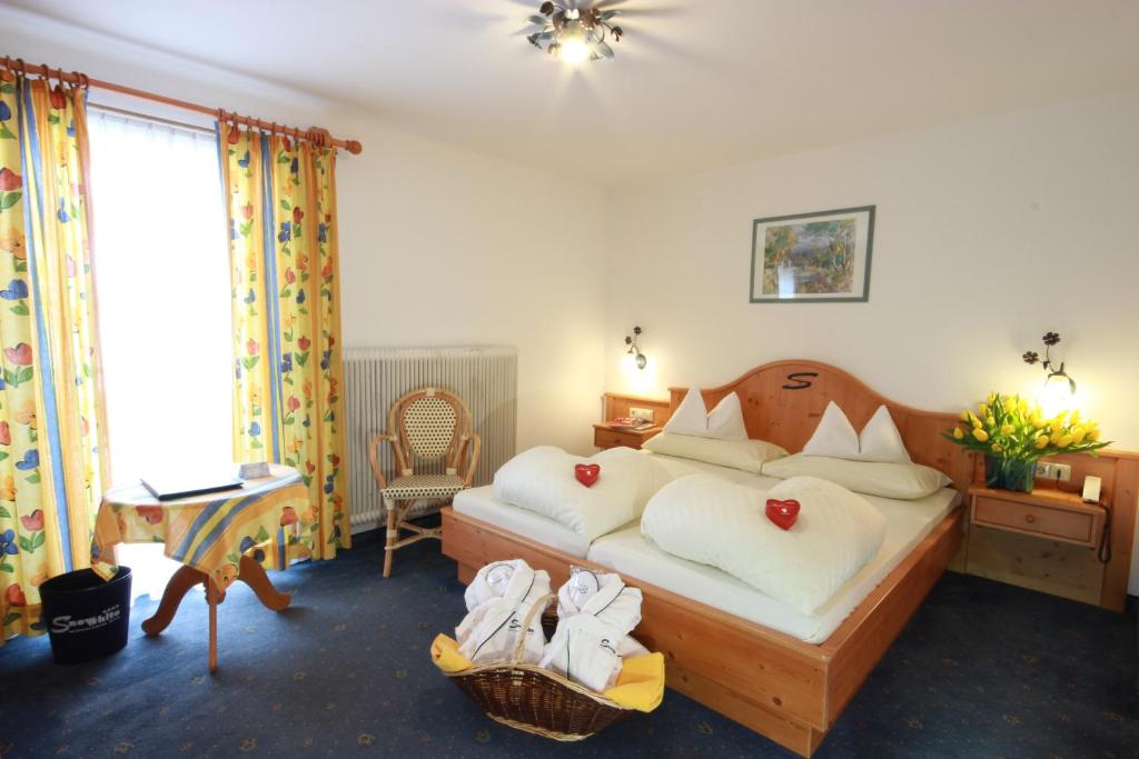 Postel nebo postele na pokoji v ubytování Sporthotel Snowwhite