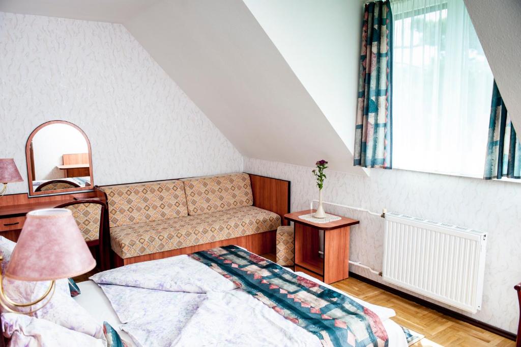 Postel nebo postele na pokoji v ubytování Beatrix Hotel