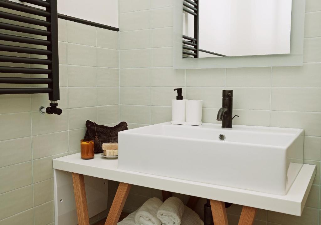 Kúpeľňa v ubytovaní Sighé Boutique Rooms - Stanze vicine all'Ospedale Panico - Soggiorno Elegante a pochi minuti di auto da Castro, Tricase Porto e Marina Serra