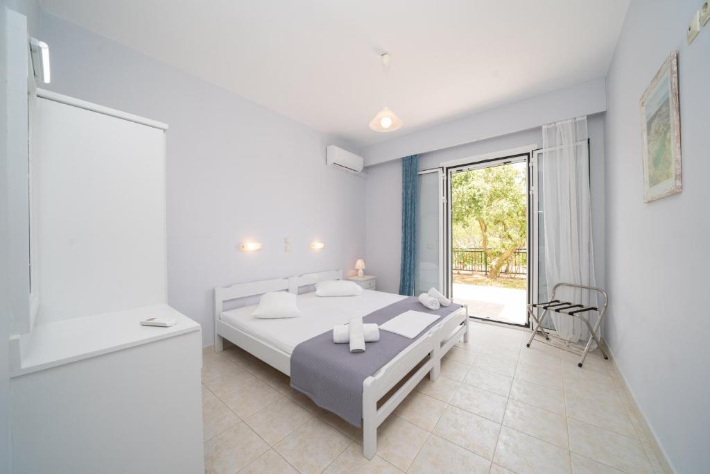A bed or beds in a room at Xi Village