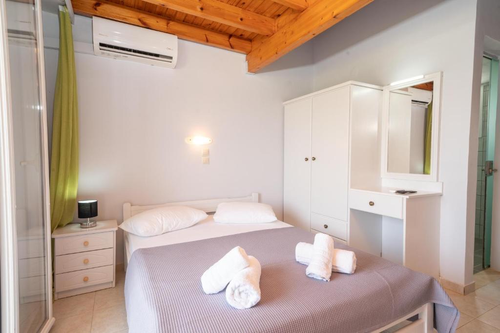 A bed or beds in a room at Xi Village