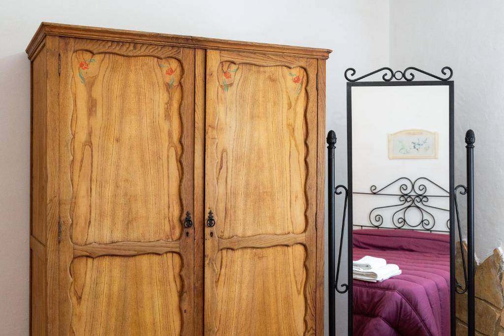 Postel nebo postele na pokoji v ubytování Hospedium DLJ Respira Cazorla