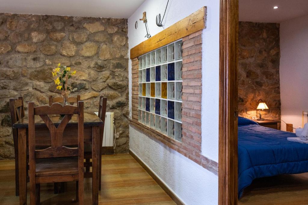 Postel nebo postele na pokoji v ubytování Hospedium DLJ Respira Cazorla