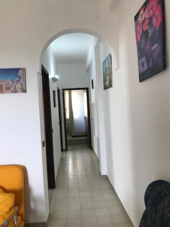 A seating area at Modern Apartment in San Giorgio Timpirussi, Sea View, 90 m²