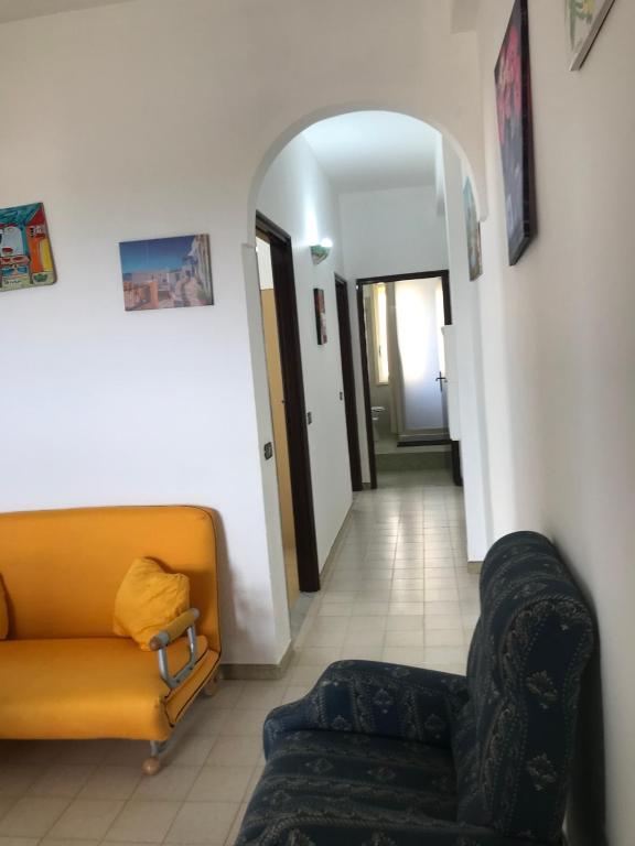A seating area at Modern Apartment in San Giorgio Timpirussi, Sea View, 90 m²