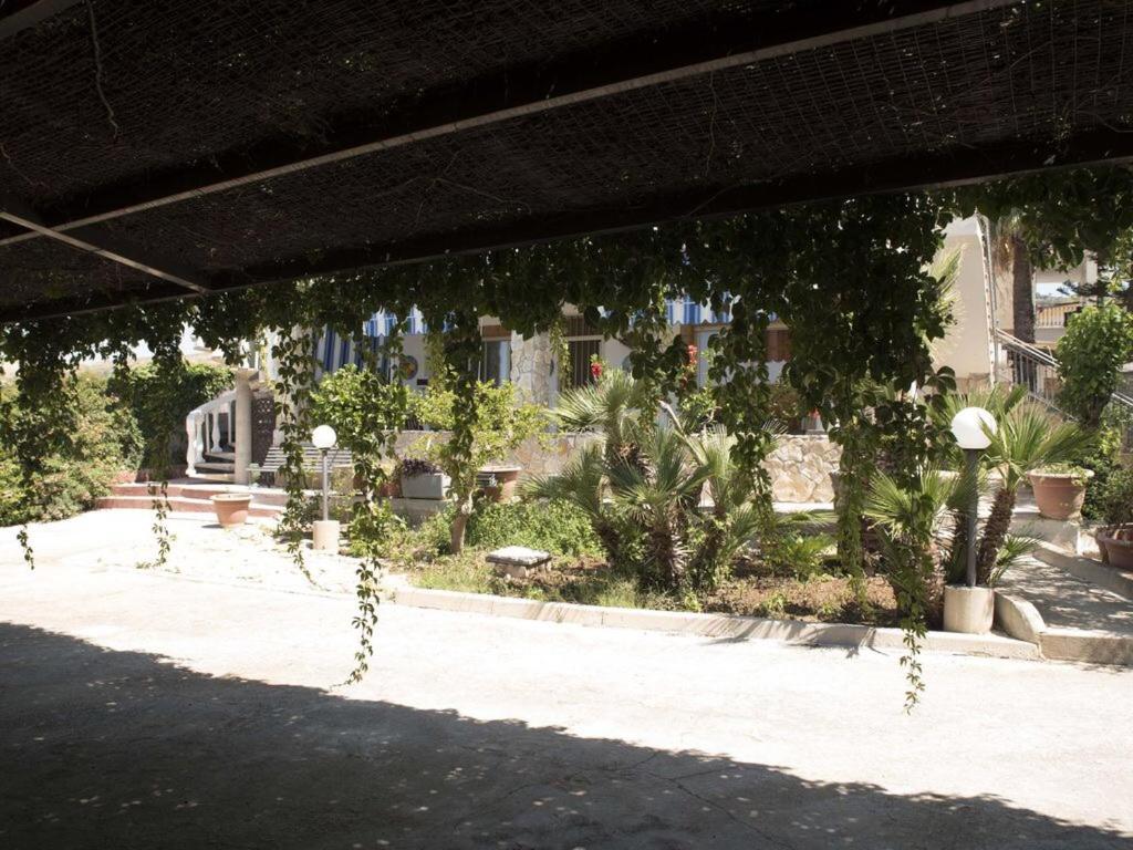 A garden outside Modern Apartment in San Giorgio Timpirussi, Sea View, 90 m²