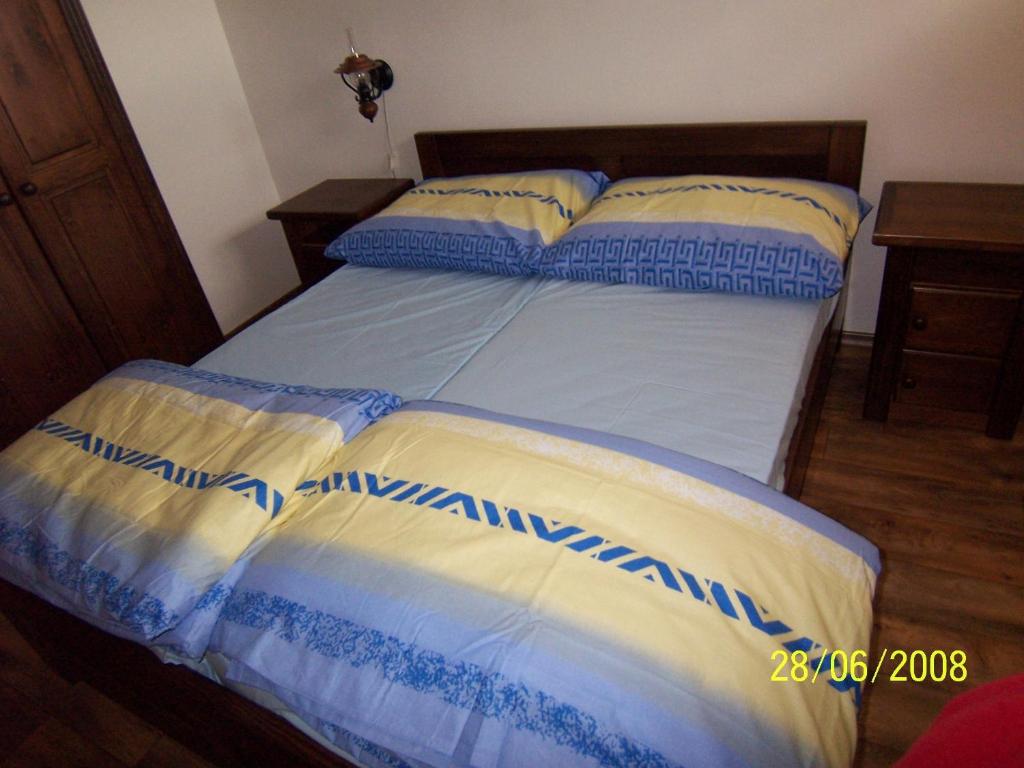 Postel nebo postele na pokoji v ubytování Penzion Silverado