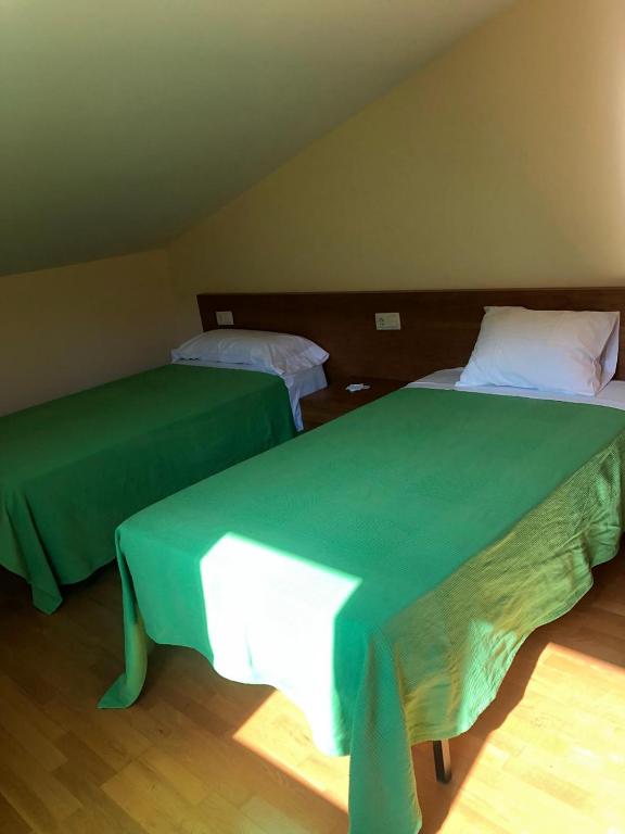 A bed or beds in a room at Chalets Tito Gómez Meis