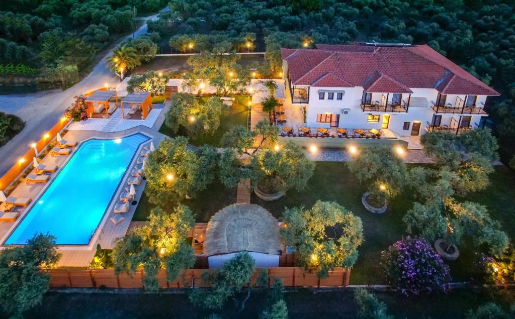 an aerial view of a house with a swimming pool at Nefeli Fresh Hotel by Del Mare in Skala Rachoniou