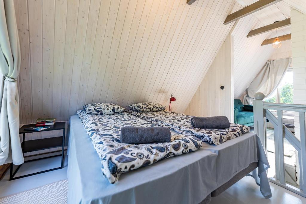 Postel nebo postele na pokoji v ubytování Huusi Holiday