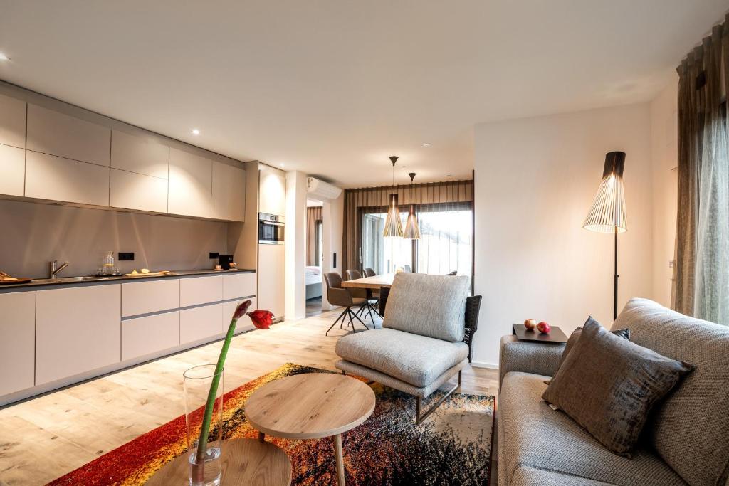 Kuchyň nebo kuchyňský kout v ubytování PRIMERA Apartments